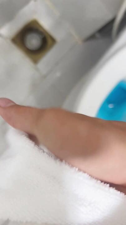 The young man escaped into the bathroom to relieve his needs.