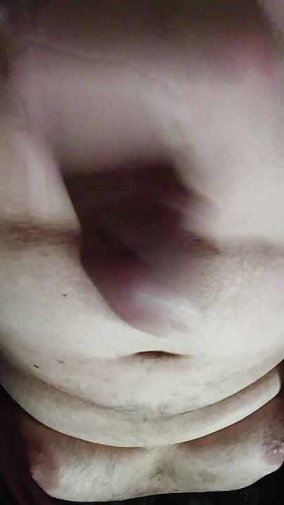 Masturbating