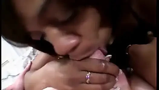 Ebony giving deep oral to a white cock