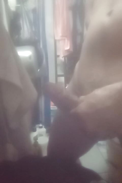 Cock plucking in the toilet