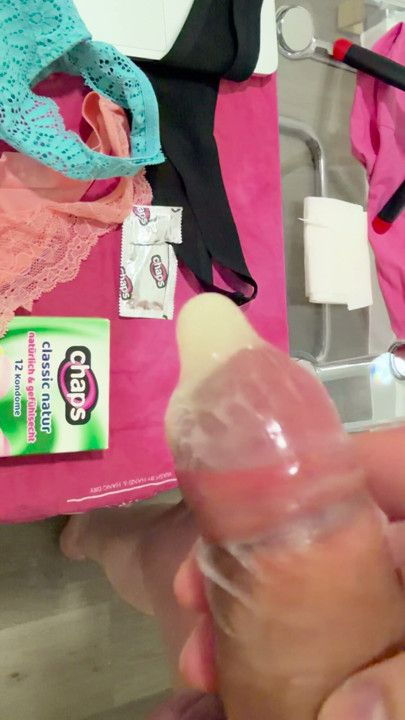 I jerk off my dick and cum inside a condom