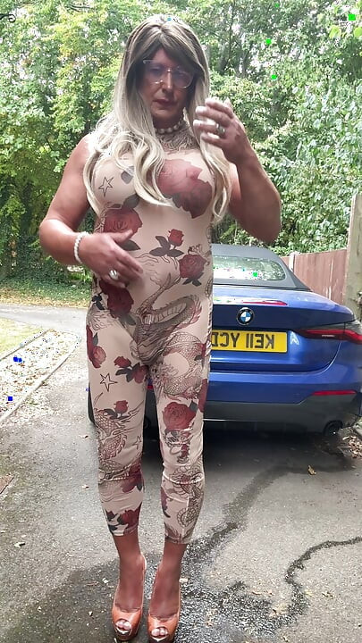 Sexy Crossdresser kellycd2022 in sexy floral see thru catsuit and heels