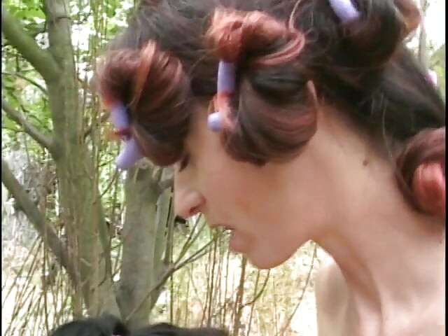 Mature woman gets a younger woman naked outside and fingers her cunt