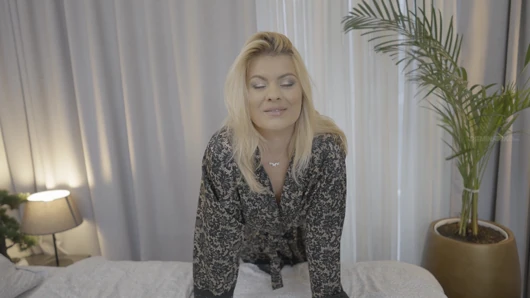 Blonde MILF Indulges in Footjob and Dildo Play