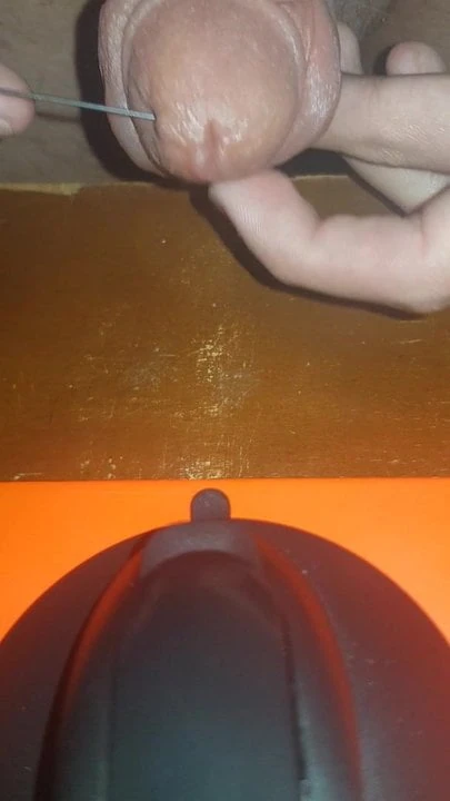 I pass a needle trough my cock head
