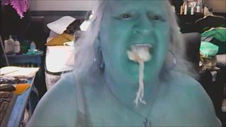 Terri with her mouth full of tampons