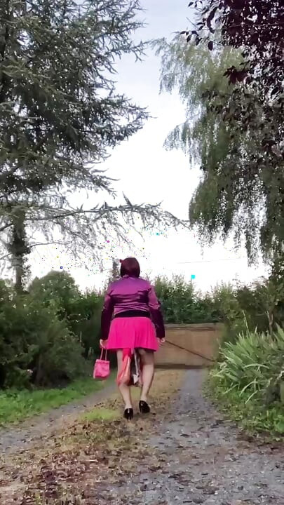 Dressed with a new pink skirt and the fuchsia tie stained with semen for a night out