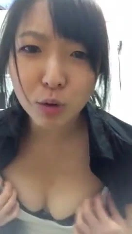 Cute Asian girl shows tits