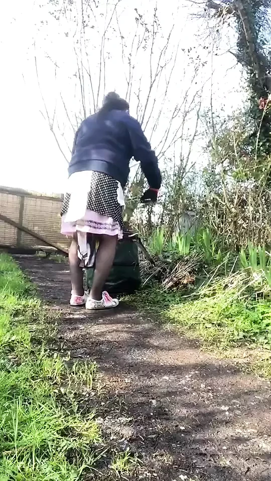 In a planter outfit for gardening for an afternoon