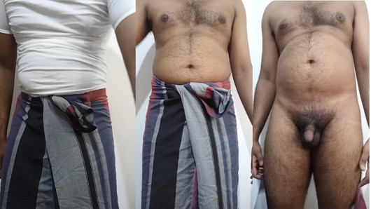 Papai de sarongue com pau preto e peludo sob a cueca