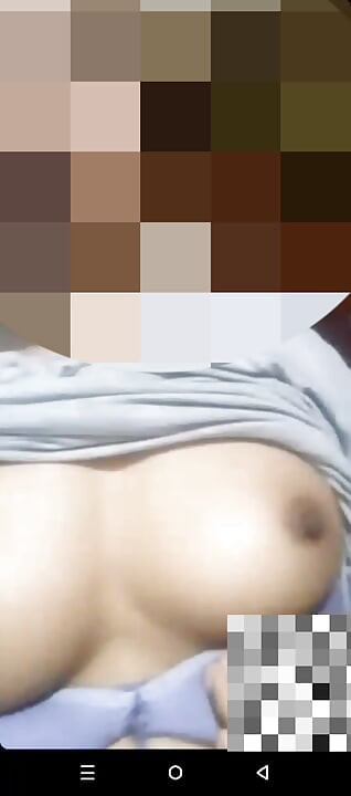 shows off her big natural breasts, in a video call