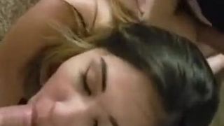 Brunette takes two cocks
