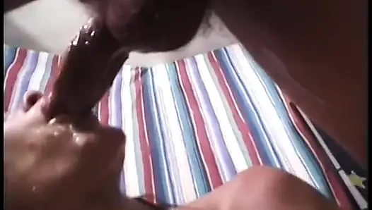 Young brunette with great eyes sucks dude's big cock and swallows a load on the sofa