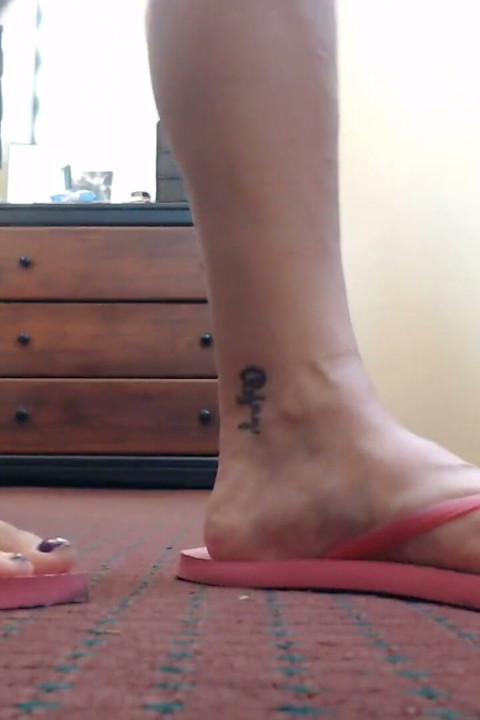 Pink flip flop walking