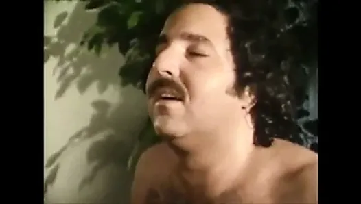 Raven Richards gives Ron Jeremy a blowjob