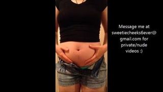Stuffed swollen belly in tight clothes