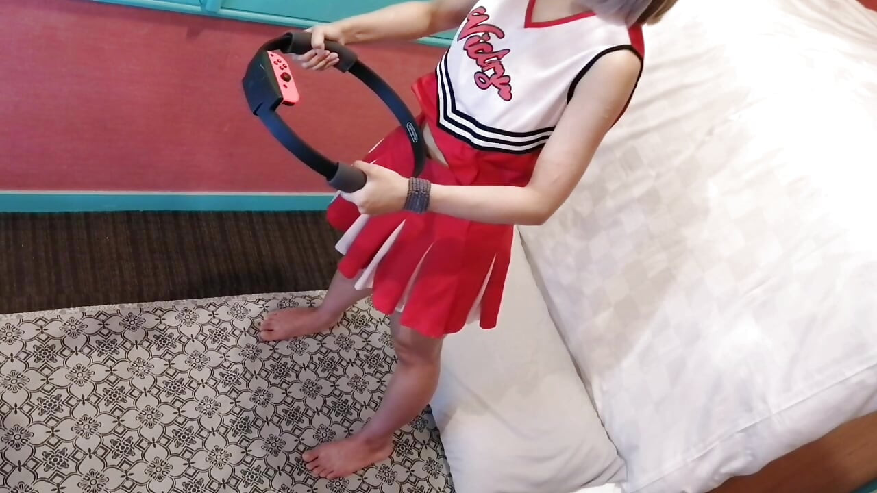 A cute, busty married woman does exercise 3 in a sexy cheerleader costume. Peeking down from above. Home made amateur Private Shoot