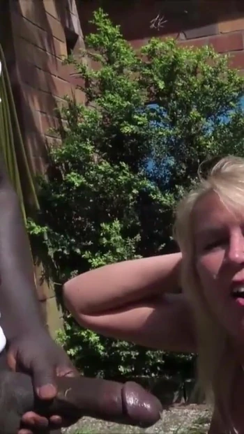 Thrilling moment from "German MILF Cougar Tina Seduce Huge Black Boy Fuck in Garden"