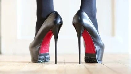 Leather high heels and opaque stocking