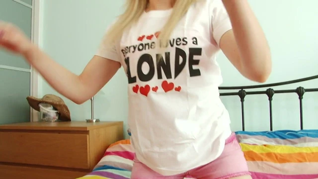 Blonde babe shows off her small tits and perky butt