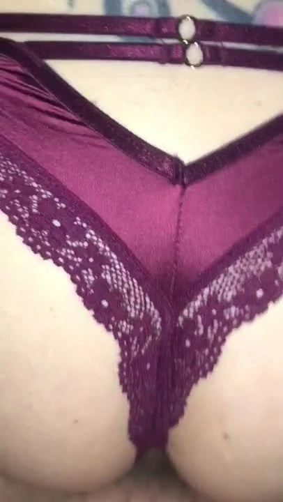 From behind