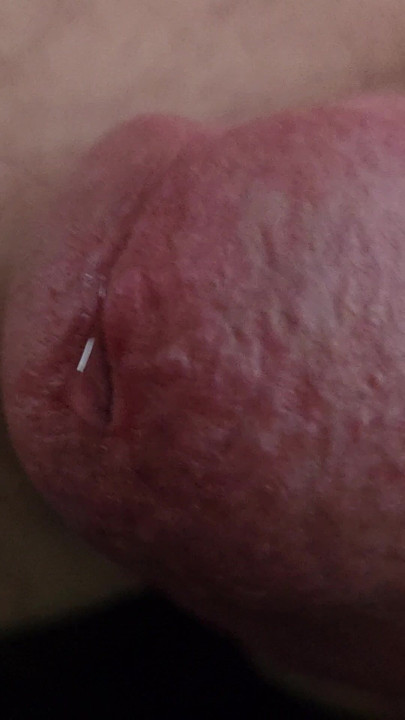 Extremely close up pre cum cock eye