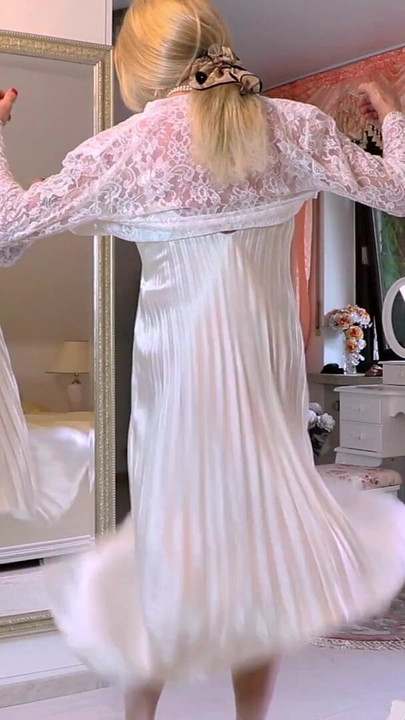 Epic moment from "Severe Caned In A Pleated Satin Gown"