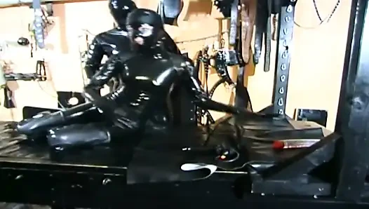 Bdsm with masked girl in latex