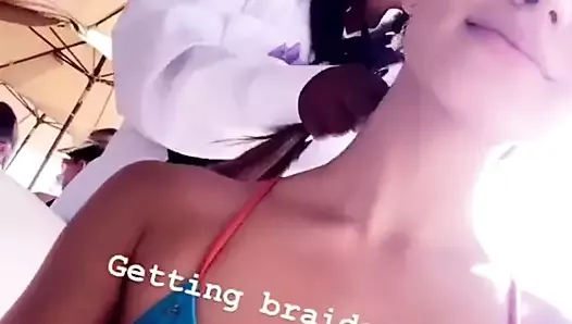 Madison Grace Reed in bikini top, getting her hair braided