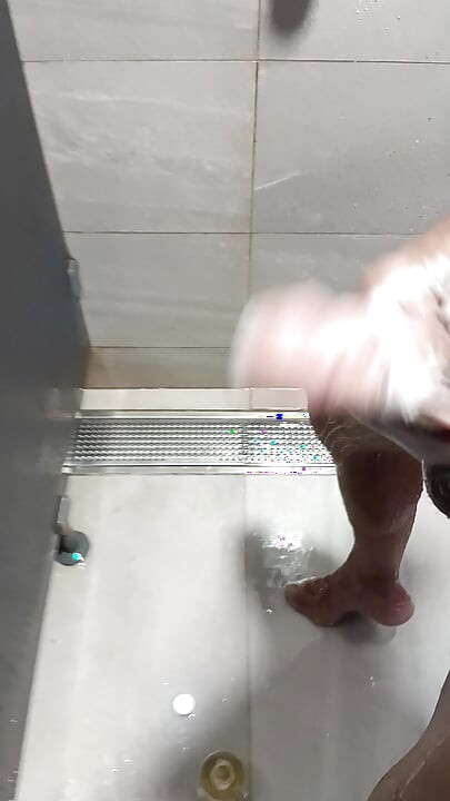 Handjob at work in the shower quickly