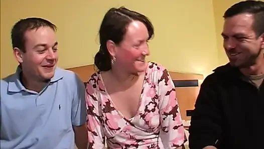 Amateur German slut fucks two horny dudes in the bedroom