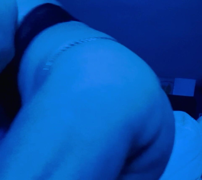 From behind