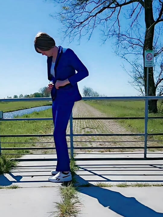 Annemieke in Blue Suit Pissing Outdoor