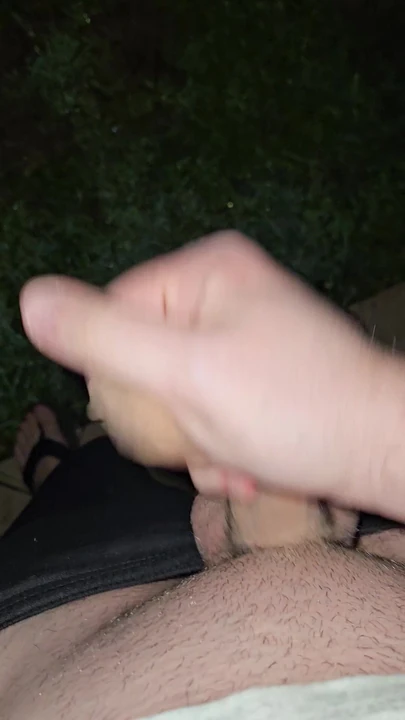 Cumshot outdoors at night