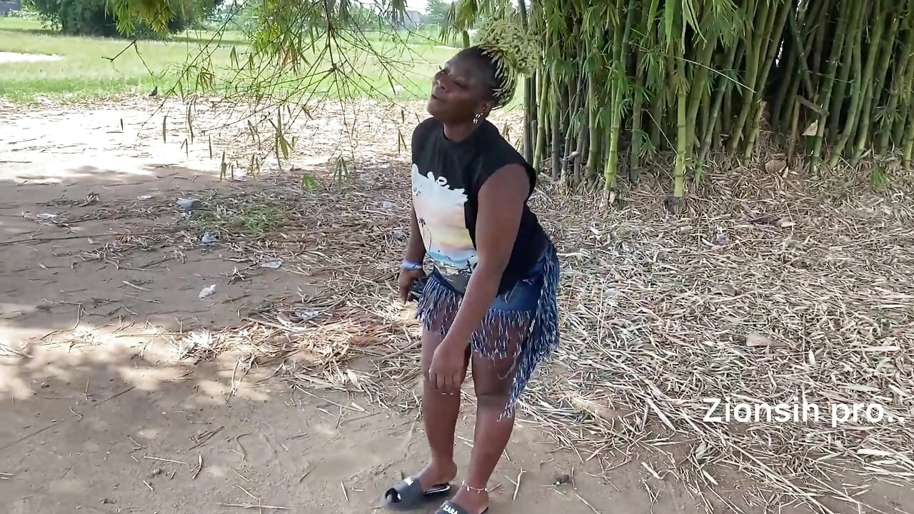 Ebony sexy black girl dances in outdoor with much laughter