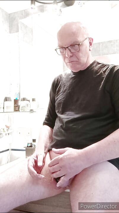 small caged cock and toothbrush