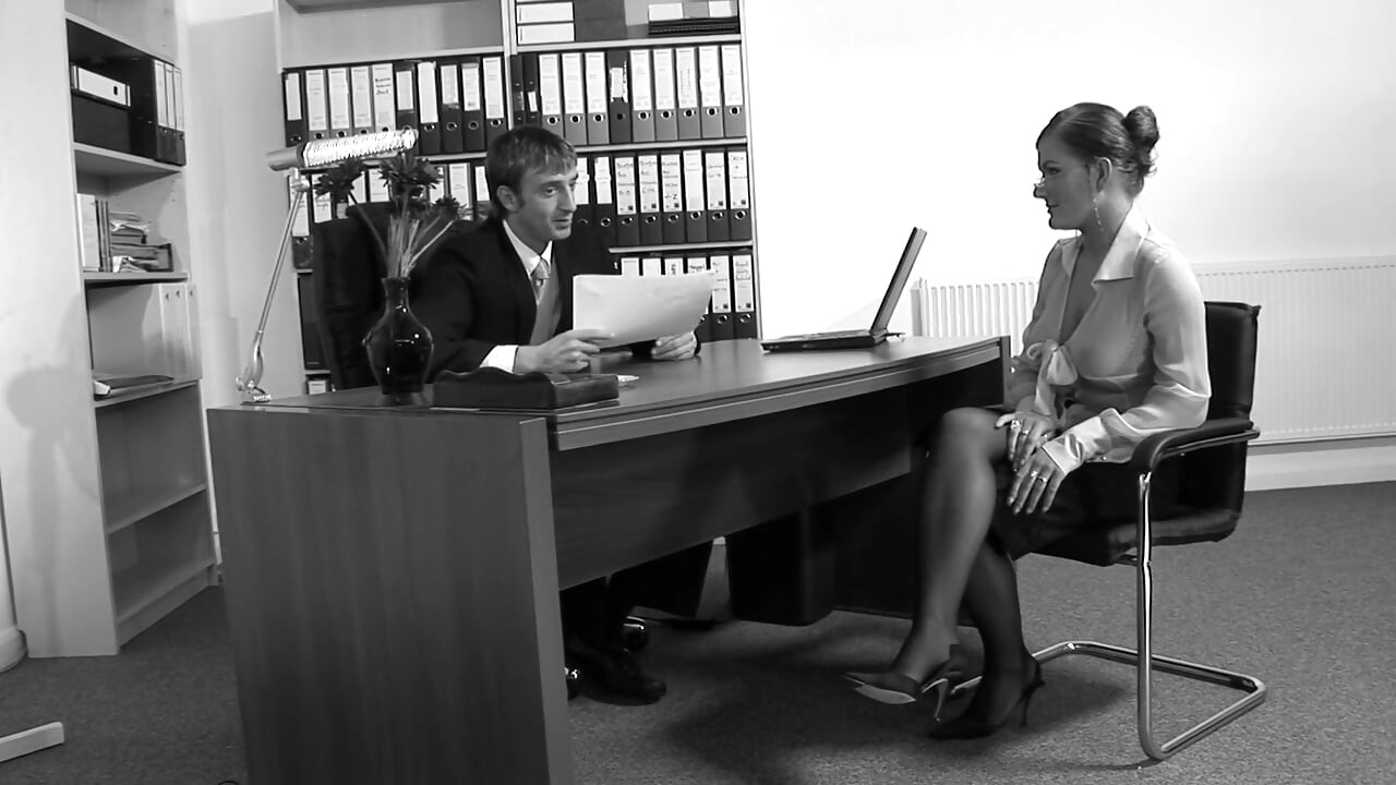 Nerdy secretary with bouncy tits fucks her boss in his office
