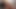 エボニーの少女がベッドで恋人に激しくセックスされながらうめく