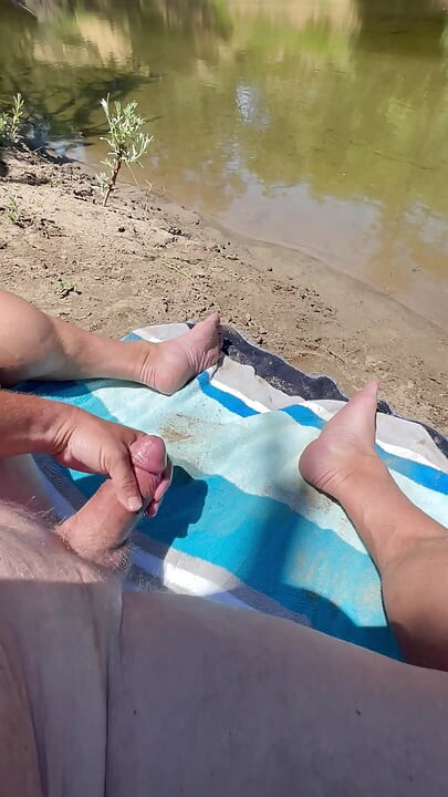 Masturbating in public along the river