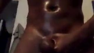 Fit oiled black guy wanking his lovely massive cock 5