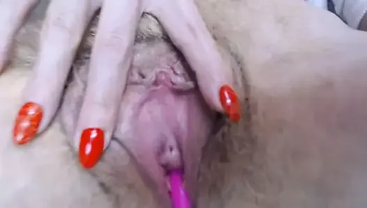 Hairy slut shows blonde pussy upclose