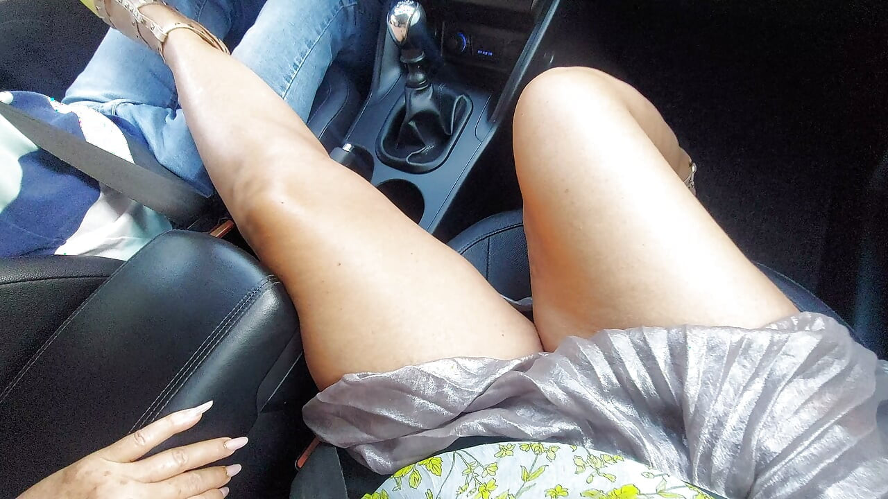 An elegant mature lady with beautiful legs in high heels seduces a taxi driver in the morning