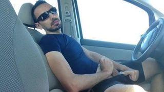 Stroking cock in the car