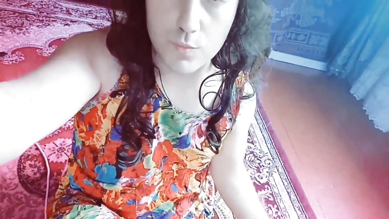 Sweet shemale posing in lace robe on soft bed