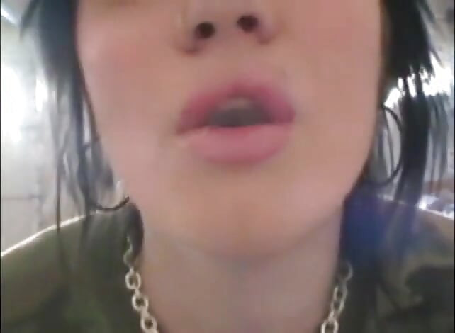 Slutty teens smoking a cigarettes in close up video