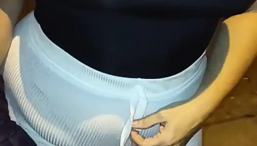 Mature Wearing Red Thread in Sheer Leggings Caught on the Street