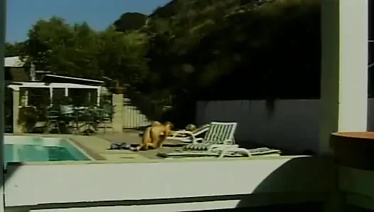 Petite blonde lesbians having fun by the pool