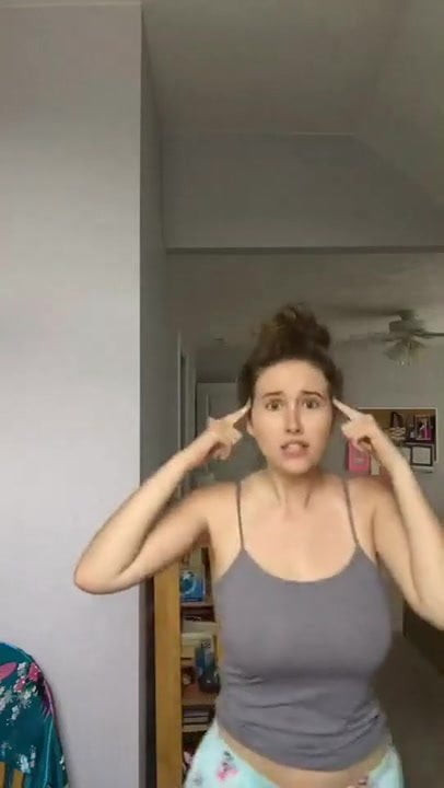 Busty babe doing a little dance - Who is she ?