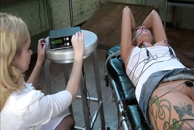 Electric pliers on nipples and pussy