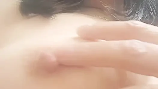 showing off her breasts and a little more of mom's